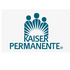 a kaiser permanente logo with three people standing next to each other.